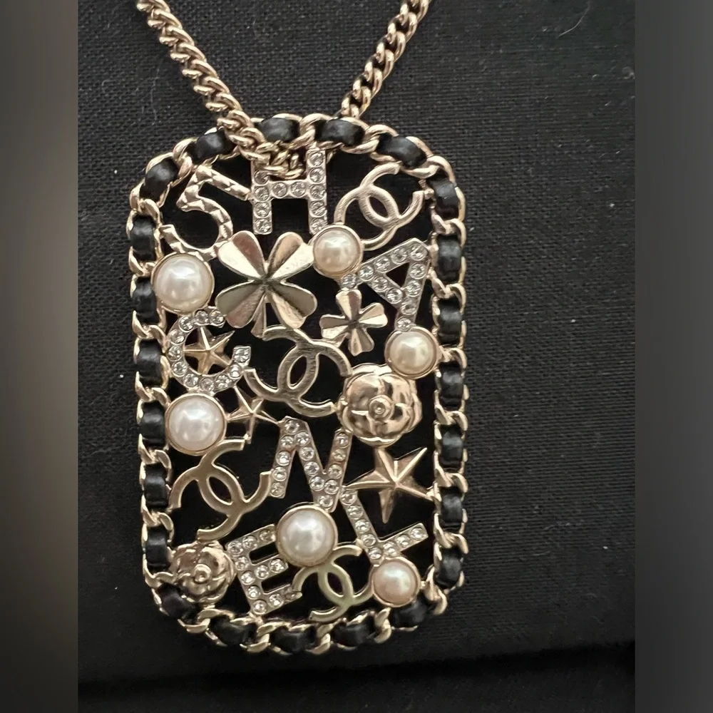 CHANEL Pendant Necklace Clover Lambskin Leather Chain Logo Crystal Mosaic Pearl